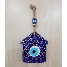 Adorno de cristal con forma de mal de ojo pintado a mano